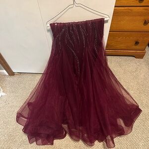 High quality dress for a special occasion (prom, weddings, high end party).